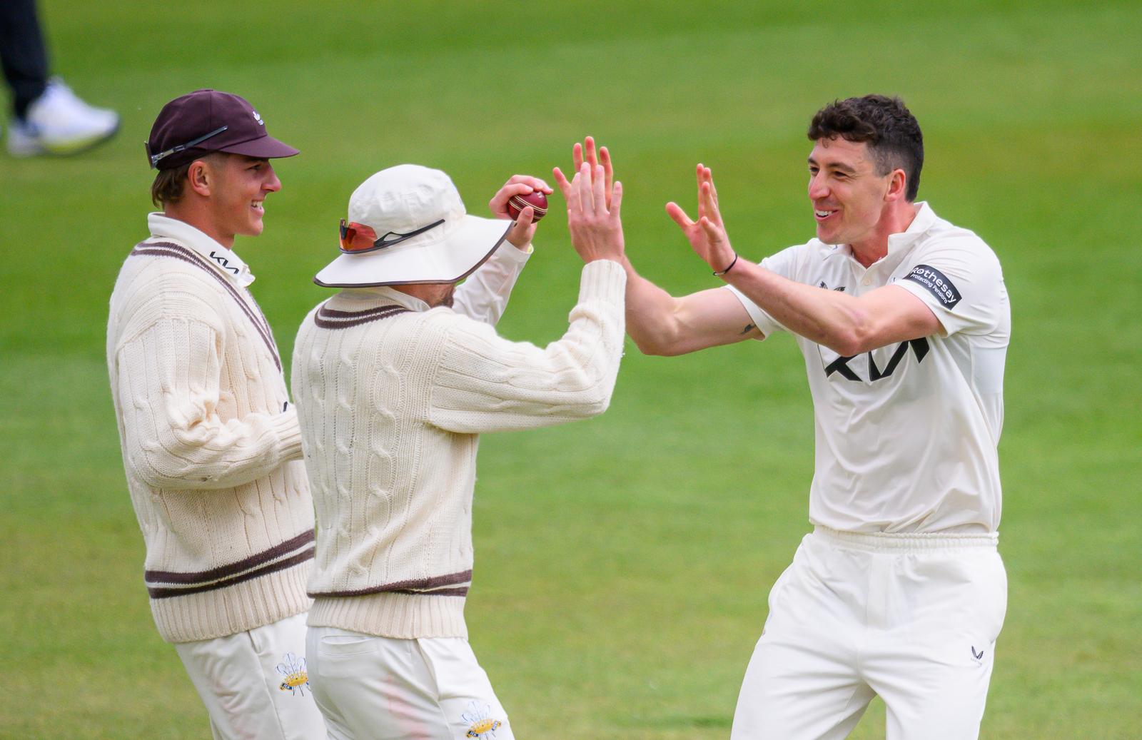Matthew Fisher celebrates a wicket against his former county
