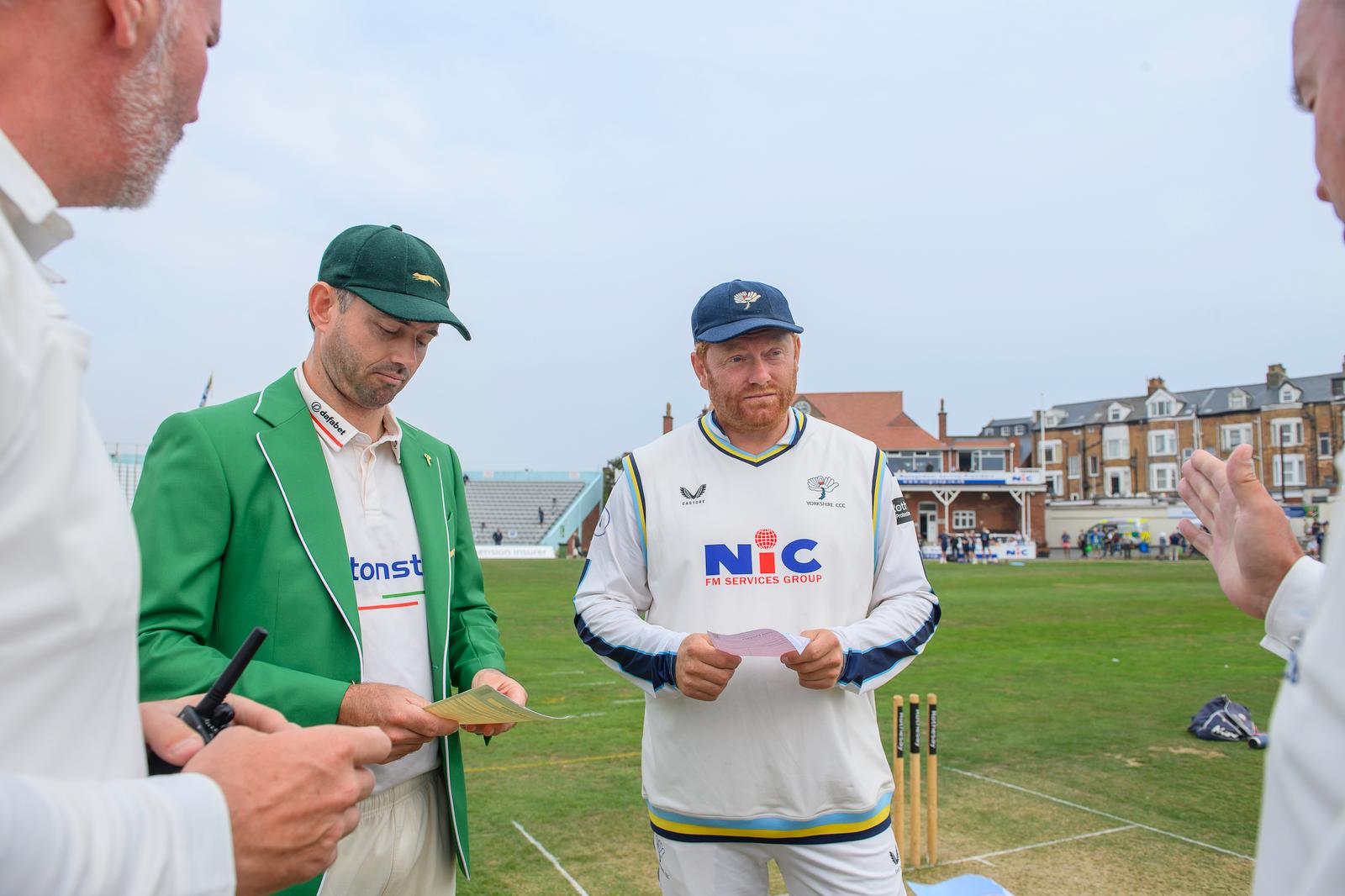 Picture by Allan McKenzie/SWpix.com - 27/08/2026 - Cricket - Rothesay County Championship - Yorkshire County Cricket Club v Leicestershire County Cricket Club - North Marine Road, Scarborough, England - Leicestershire and Yorkshire captain's Ian Holland and Jonny Bairstow at the coin toss.