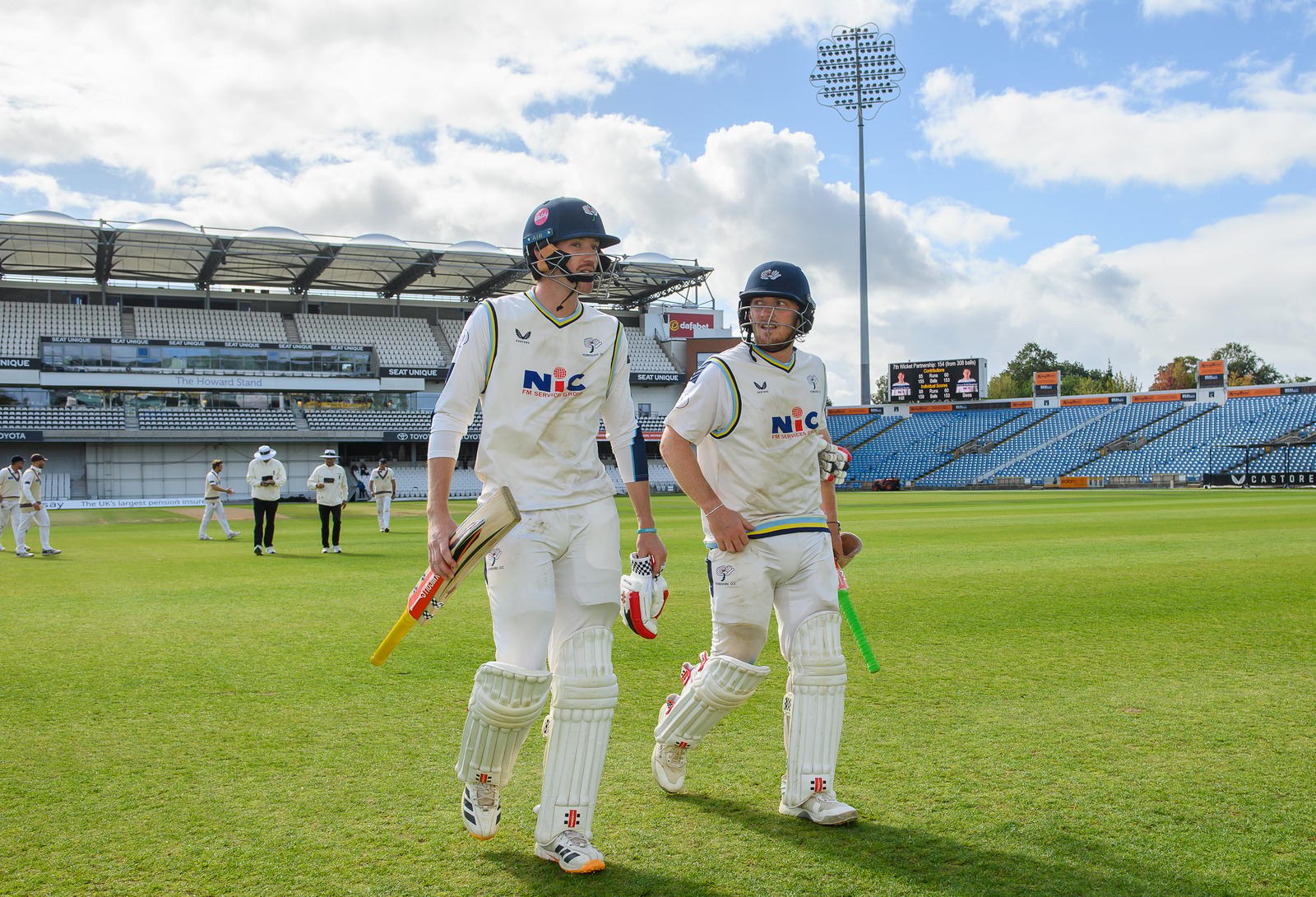 Picture by Allan McKenzie/SWpix.com - 17/09/2026 - Cricket - Rothesay County Championship - Yorkshire County Cricket Club v Somerset County Cricket Club - Headingley Cricket Ground, Leeds, England - Yorkshire's George Hill and Dom Bess leave the field at lunch against Somerset after compiling a partnership of over 150.